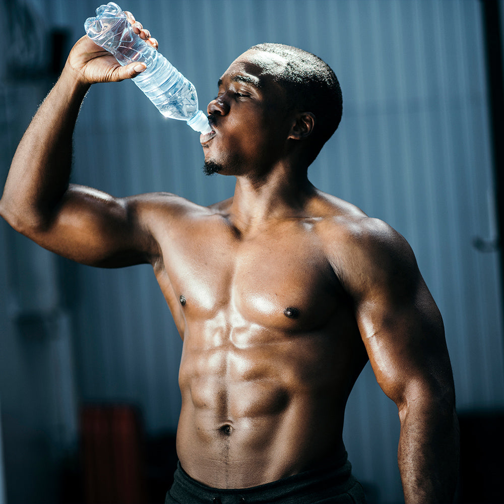 Man drinking from a water bottle