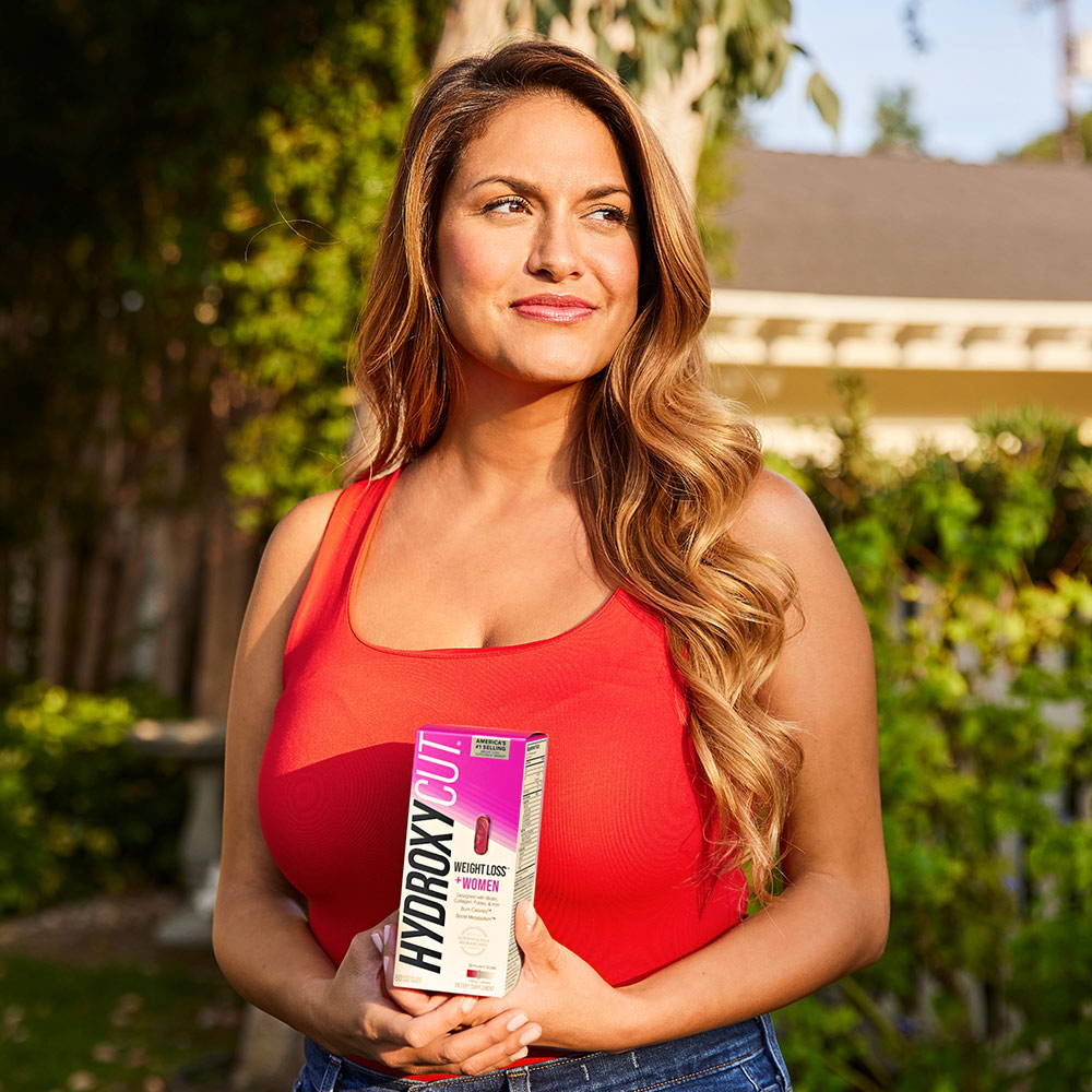BrieAnna holding a box of Hydroxycut +Women